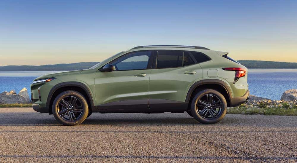 A side angle view of a green 2025 Chevy Trax.