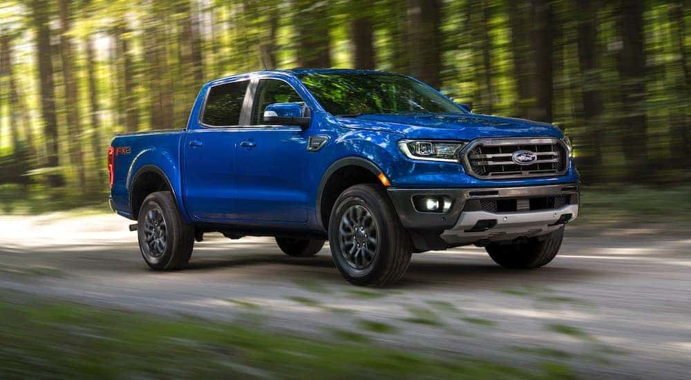 A blue 2019 Ford Ranger is shown from the front at an angle after leaving a dealer that has used trucks for sale near Salt Lake City.