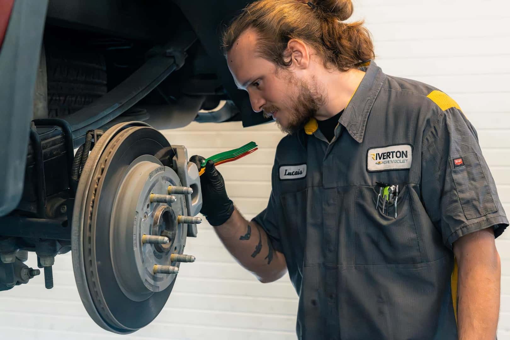 Person working on brakes