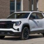 White GMC Terrain SUV parked outside a brick building at Riverton Elko