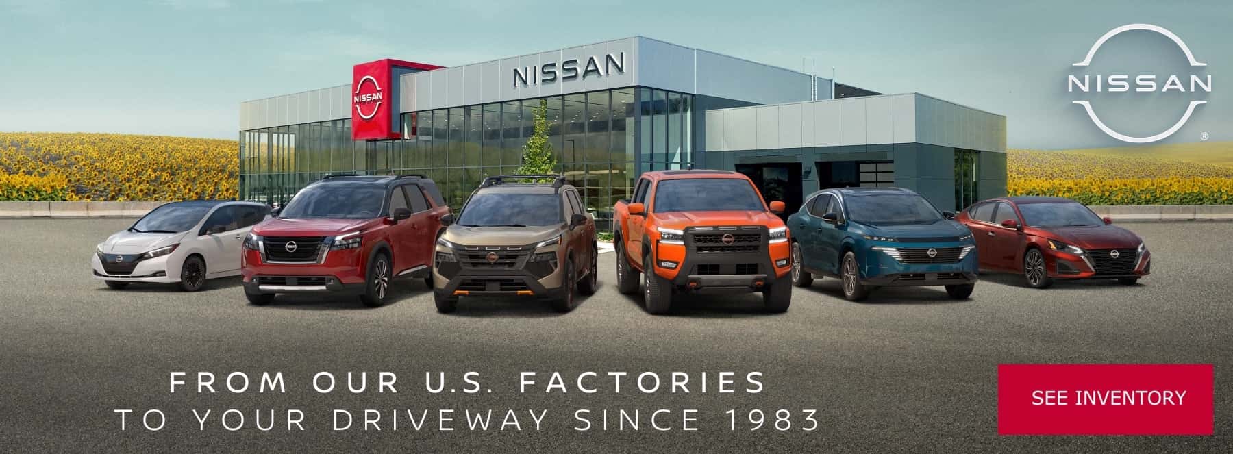 New Nissan vehicles in front of dealership