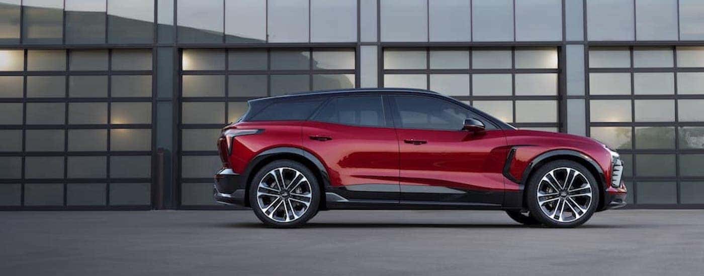 A red 2024 Chevy Blazer EV is shown from the side.