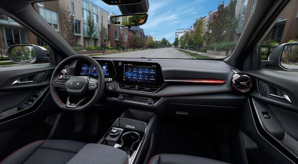 The black interior of a 2025 Chevy Equinox RS is shown.