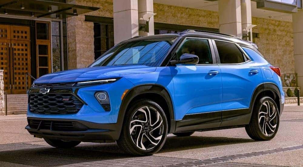 A blue 2025 Chevy Trailblazer RS parked at a Chevy dealer near Indianapolis.