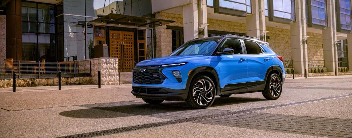 A blue 2024 Chevy Trailblazer RS for sale parked in a city