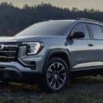 A gray 2026 GMC Terrain Elevation for sale parked off-road
