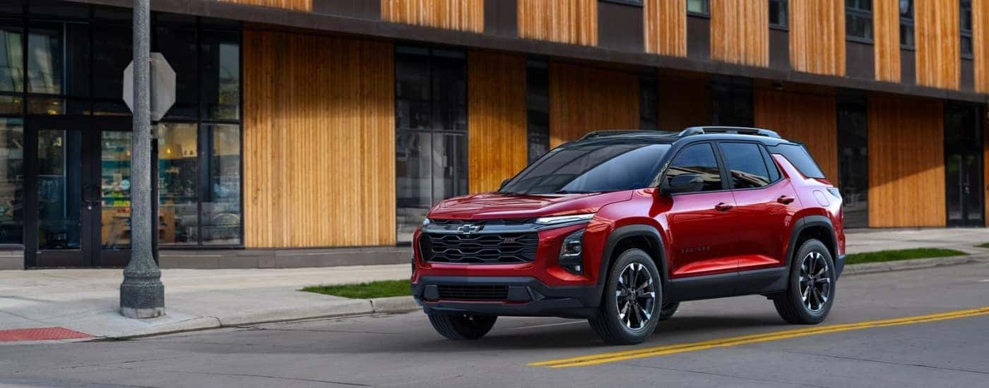 A red 2025 Chevy Equinox from the front.