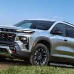 Silver 2026 Chevy Traverse Z71 parked on a hill