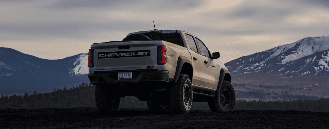 Rear of a beige 2026 Chevy Colorado