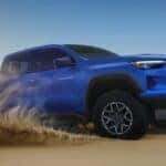 A blue 2026 Chevy Colorado ZR2 off-roading.