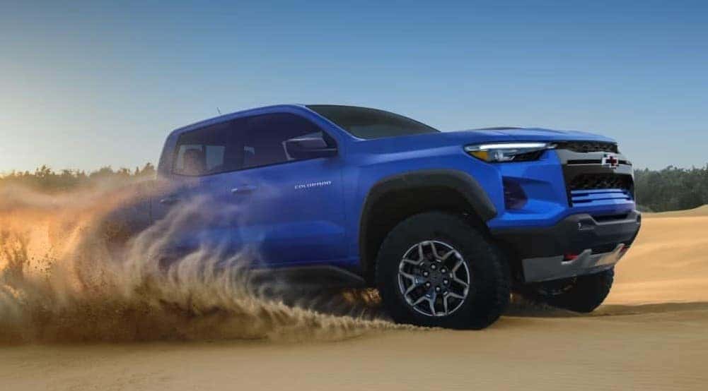 A blue 2026 Chevy Colorado ZR2 off-roading.