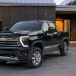 Black 2026 Chevy Silverado HD 2500 parked in a driveway