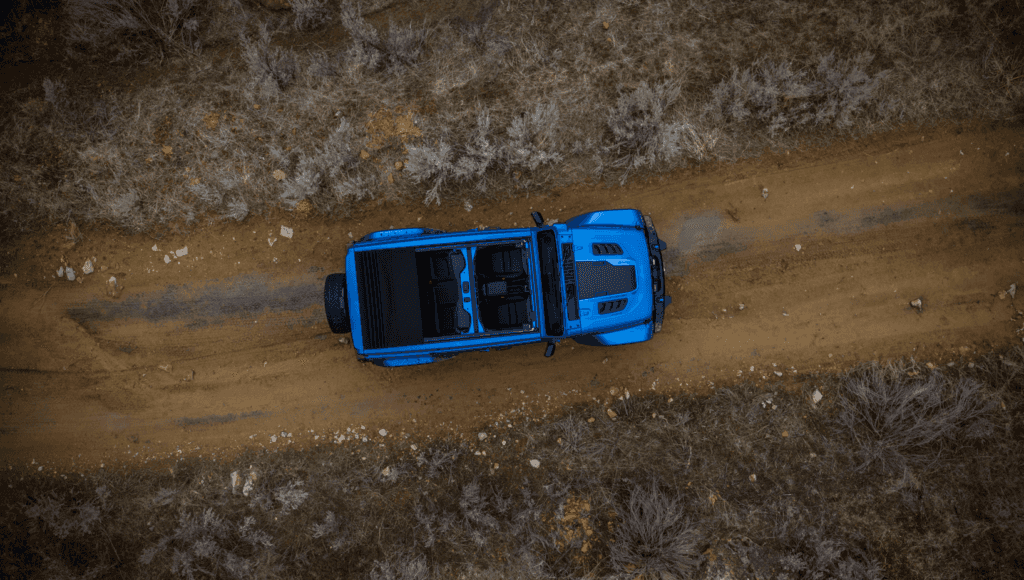 2025 Jeep Wrangler 4xe Outside on a dirt road