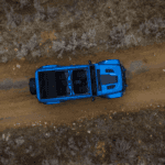 2025 Jeep Wrangler 4xe Outside on a dirt road