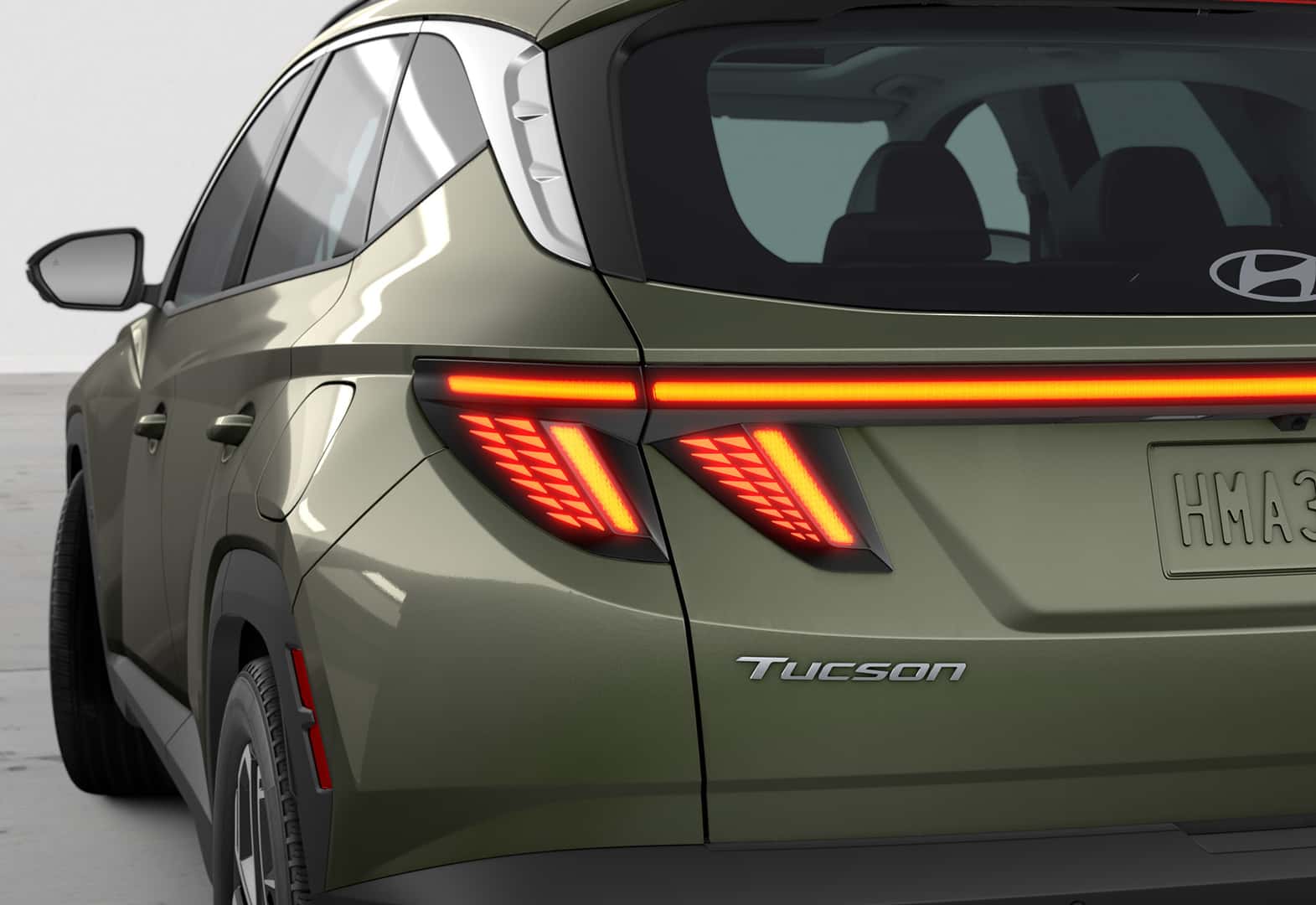 2025 Hyundai Tucson Limited AWD in Rockwood Green rear exterior view at Wolfchase Hyundai Memphis TN